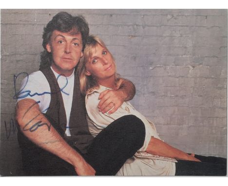 PAUL MCCARTNEY SIGNED. A promotional postcard depicting Paul and Linda McCartney signed in blue ink by Paul McCartney. Includ