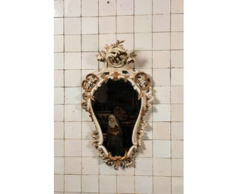 Full title: A carved polychrome wooden mirror with floral design, 19th C.Description:93,5 x 54,5 cmAbout this sale: Paul De G