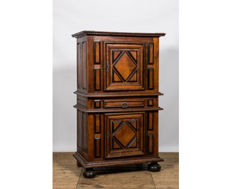 Full title: A walnut two-door cabinet with ebonised accents, 17th C.Description:H 200 x L 120 x D 73 cmAbout this sale: Paul 