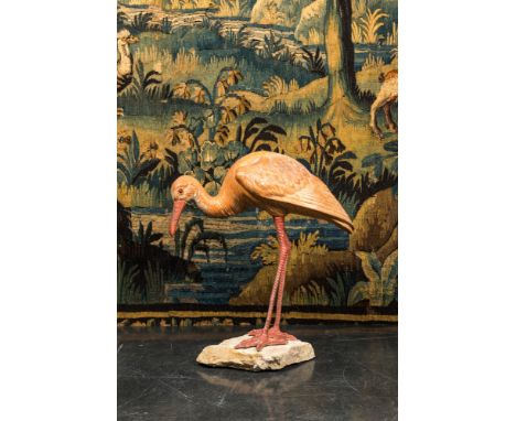 Full title: A polychrome plaster ibis on a stone base, 20th C.Description:H 55 x L 48 cmAbout this sale: Paul De Grande is on