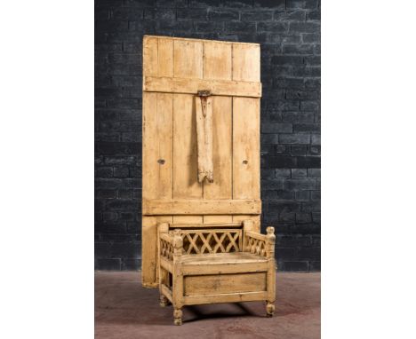 Full title: An Irish wooden settle chair, 19th C.Description:H 197 x L 92,5 x D 55,5 cm (as chair)H 69,5 x L 184 x D 93 cm (a