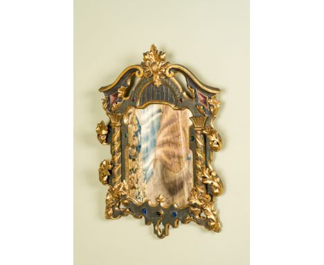 Full title: A painted and partly gilt carved wooden 'columns' mirror with cabochons, 19/20th C.Description:68 x 46 cmAbout th