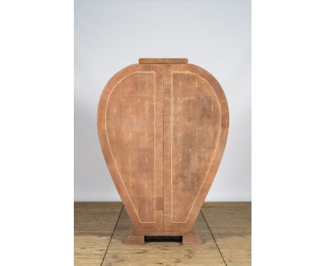 Full title: A light pink leather-clad two-door cabinet, 20th C.Description:H 173 x L 124,5 x D 45,5 cmAbout this sale: Paul D