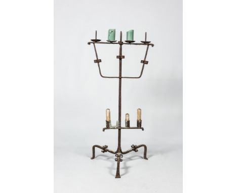 Full title: A large wrought iron candlestick, 15th C. or laterDescription:H 129,5 x L 63 x D 54,5 cmAbout this sale: Paul De 