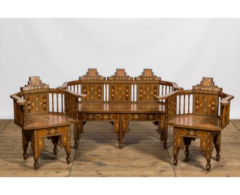 Full title: A North African salon set comprising a sofa and two armchairs with intarsia, 20th C.Description:H 84 x L 137 x D 