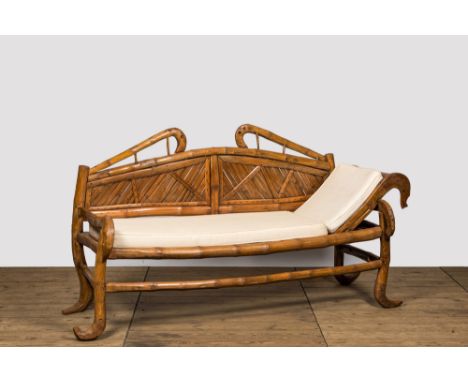 Full title: An oriental bamboo sofa-bed, 20th C.Description:H 103 x L 196 x D 70 cmAbout this sale: Paul De Grande is one of 