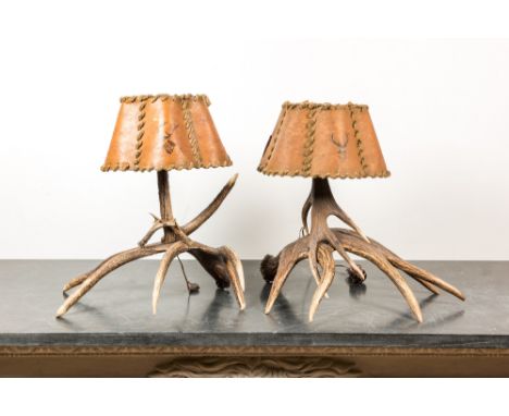 Full title: A pair of deer antler table lamps, 20th C.Description:H 60 cm x L 70 cmAbout this sale: Paul De Grande is one of 