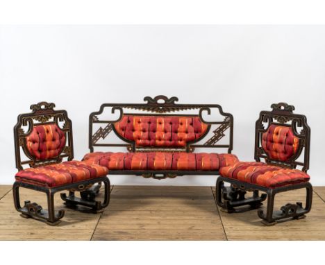 Full title: A French oriental inspired three-piece salon set including a sofa and a pair of armchairs, 19th C.Description:The