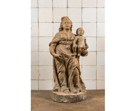 Full title: A Flemish carved stone figure of the Madonna with Child, 17th C.Description:H 65,5 cmÊ Expert: Cabinet Benoit Ber