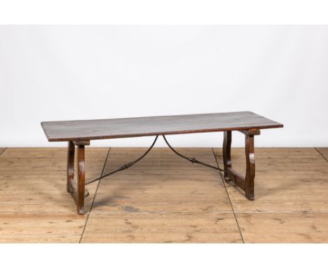 Full title: A Spanish wrought iron mounted wooden table, 19th C.Description:H 56 x L 168 x D 66,5 cmAbout this sale: Paul De 