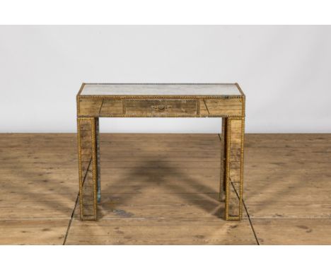 Full title: A brass-mounted mirror glass console, 20th C.Description:H 72 x L 90 x D 35,5 cmAbout this sale: Paul De Grande i