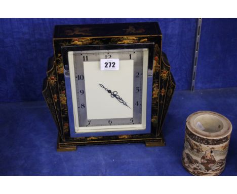A early 20th Century lacquered mantel clock and three Oriental vases (4)