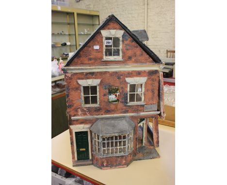 A village shop dolls house with furnishings to inside and a yogi bear puppet