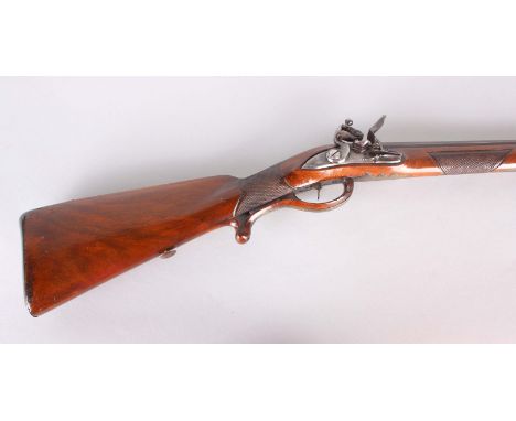 A North European Flintlock Sporting Gun with hexagonal sighted barrel inlaid with gilt maker’s mark at the breech, stepped lo