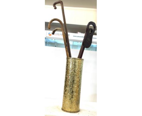 Brass stick stand with walking sticks etc 