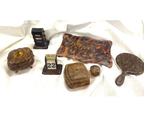 Selection vintage plastic tortoiseshell effect trinkets, tray, mirror and a bakelite calendar 