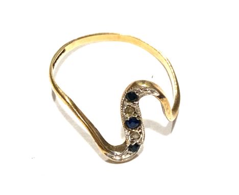 9ct Vintage asymmetric ribbon ring set with sapphire and diamond, approximate weight 1.3g 