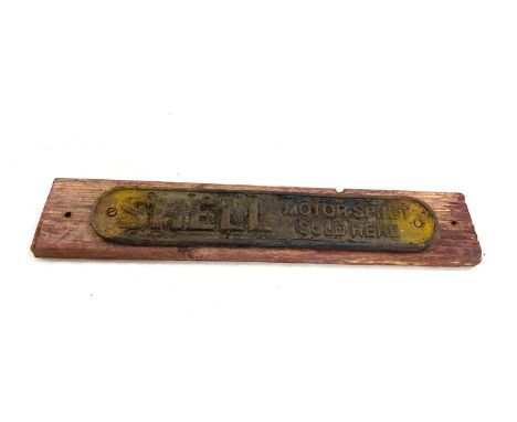 Vintage cast Shell sign, on wooden plaque, measurements of sign: Length 28 cm, width 5cm 