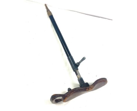 Antique adjustable height shooting stick, with leather saddle , named underneath 