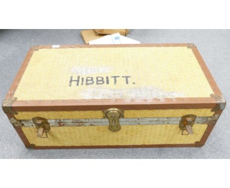1930's wood and metal bounded travelling trunk.