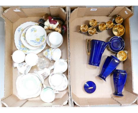 A collection of pottery to include Crown Devon blue and gold pottery set, H&K pair of vases, commemorative items, etc. (2 tra