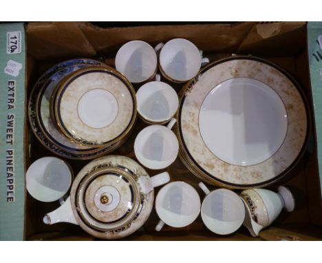 A collection of Wedgwood Cornucopia dinnerware to include cups, saucers, side plates, tea pot, etc. (29)