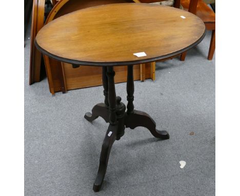 Oval oak tripod tilt-top table 