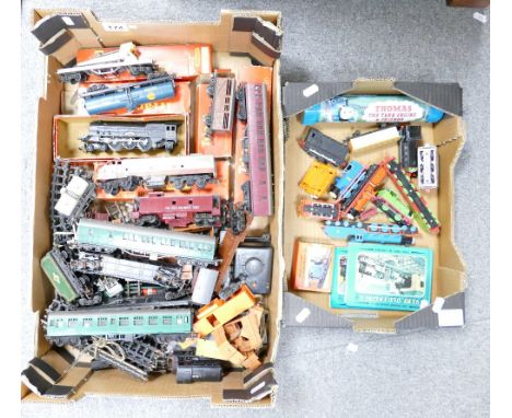 A collection of Tri-ang trains including carriages, engines, rocket launching wagon, tenders, track, etc. (some boxed) and a 