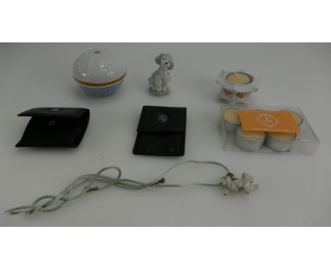 A collection of Lladro collectors items including candle holders, round box & cover, leather wallets, privileged collectors f