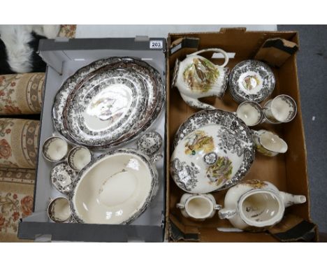 A large collection of Royal Worcester Palisey dinnerware with game bird decoration to include serving platters, plates, cups,