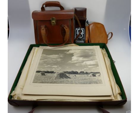 A collection of 1950's photography equipment to include Rolleiflex 3.5 TLR camera serial number 1427505 with Zeiss opton lens