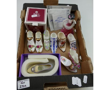 A collection of ceramic shoes from the historic miniature shoes collection by Coalport, Spode, Royal Worcester, Masons, toget