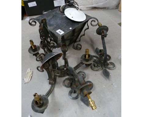 A collection of wrought iron wall lights to include large exterior lambton wall sconces and ceiling lamp. (4)