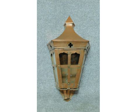 An Art and Crafts style copper wall mounted lantern. H.55cm 
