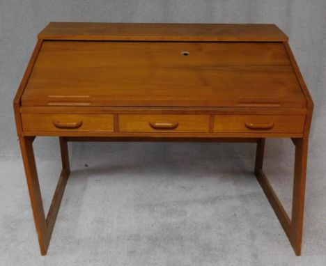 A 1970's vintage light oak desk with fitted interior and tambour shutter. H.96 W.102 D.70cm 