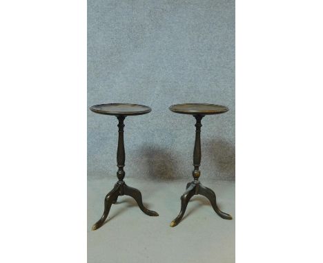 A pair of Georgian style mahogany lamp tables on tripod cabriole supports. H.57cm 