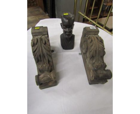 CARVING, pair of foliate carved shelf brackets; together with ethnic carved hardwood portrait bust 