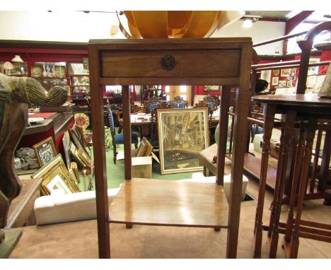 An oak single drawer lamp table with undertier