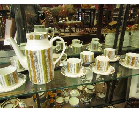 A Midwinter "Sienna" coffee set comprising of coffee pot, milk and sugar bowls, six cups and saucers
