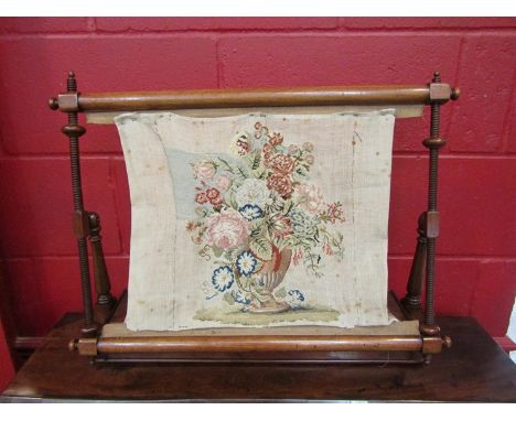 A circa 1840 mahogany tapestry needlepoint work stand with lidded thread box base