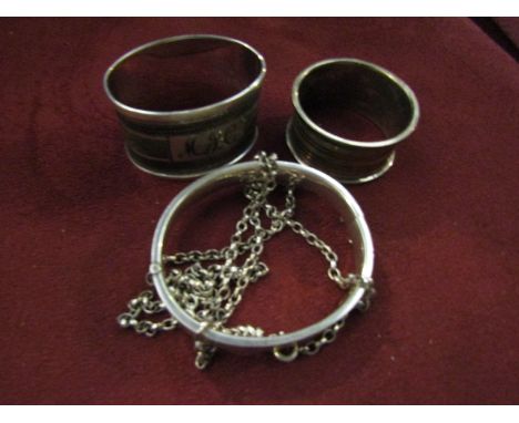 Two silver napkin rings, necklace and bangle (4)
