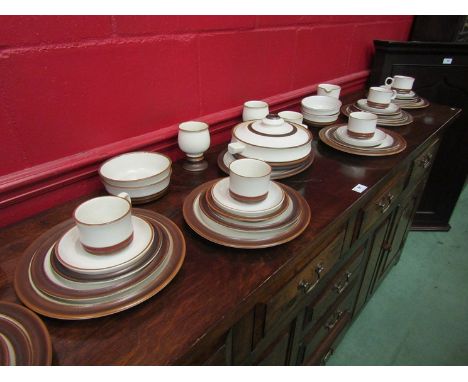 A Denby "Potters Wheel" collection of tablewares including casserole, meat plate, cups, saucers, jug, two goblets, plates and