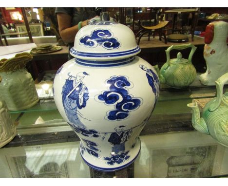 An Oriental lidded bulbous ginger jar form lamp base with figural design
