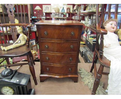 A Georgian style flame mahogany serpentine front chest of small proportions, the four drawers on bracket feet, 74cm x 50cm x 
