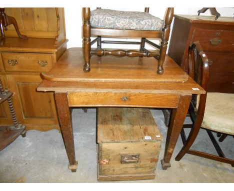 Light oak wind-out table a/f