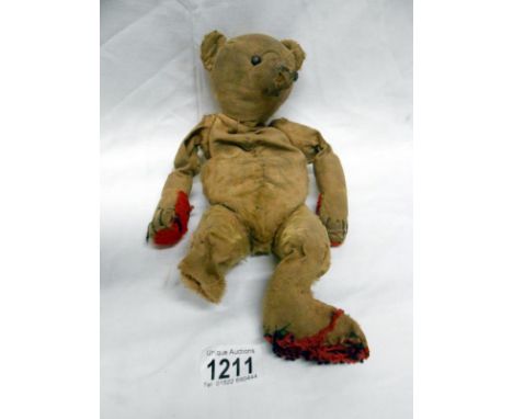 Old teddy bear, in poor condition, possibly Steiff