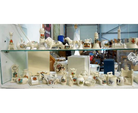 A large quantity of crested china including Arcadian and Carlton Ware