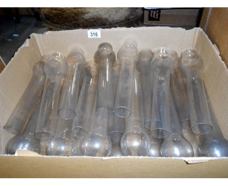 A quantity of oil lamp chimneys