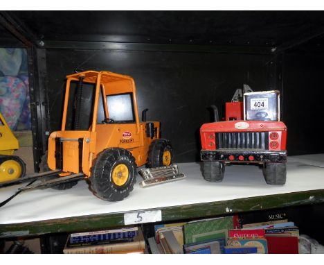 A large Tonka wrecker & a fork lift truck