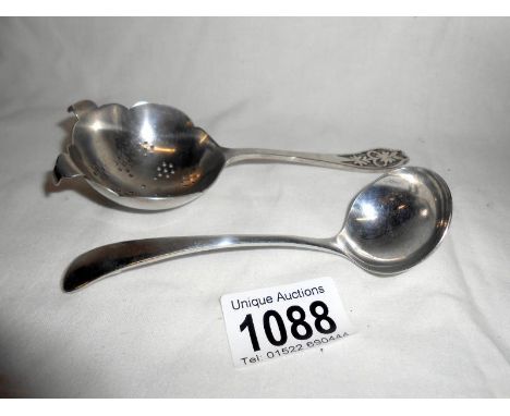 Silver tea strainer HM Sheffield 1960 approx. 55gm and small silver ladle HM Sheffield 1964 approx. 30gm, both E.V.